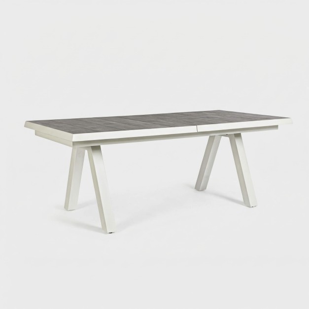 Vista general de la mesa ARIA TERRAZZA COLLECTION® en acabado blanco con tablero efecto madera