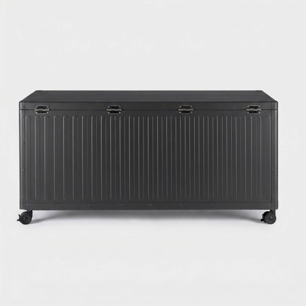 Vista lateral del baúl COS M con ruedas integradas 2